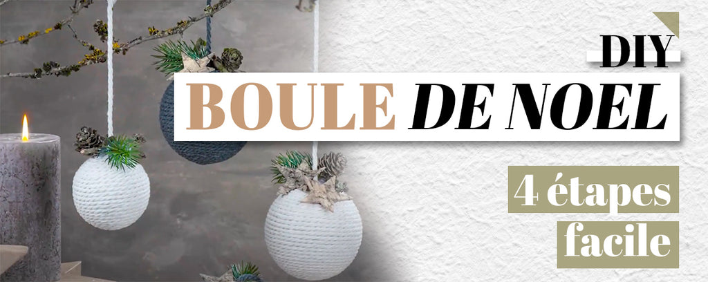 3 boules de noel en macramé à côté d'une bougie allumée